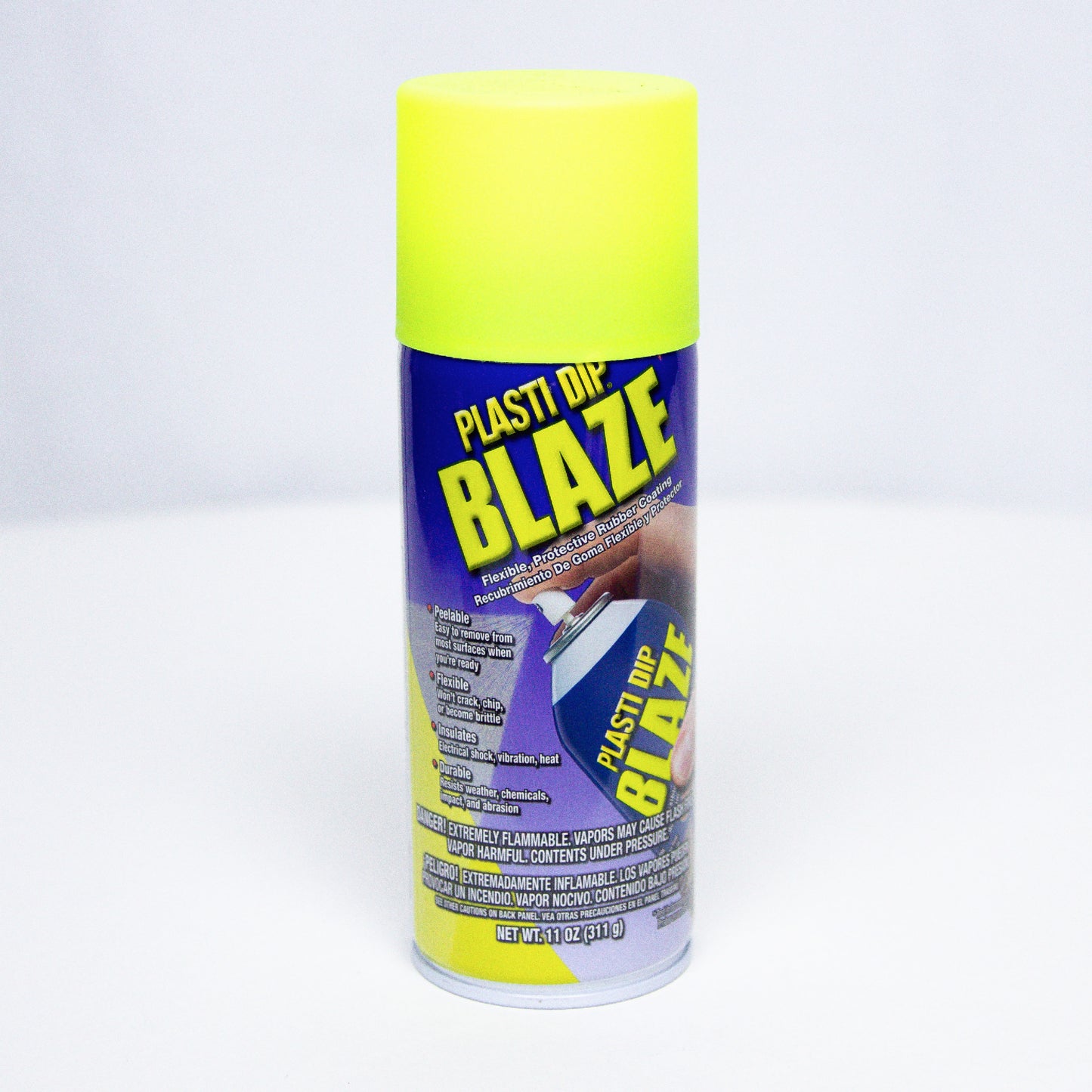 Can of neon yellow aerosol Blaze Plasti Dip on white background